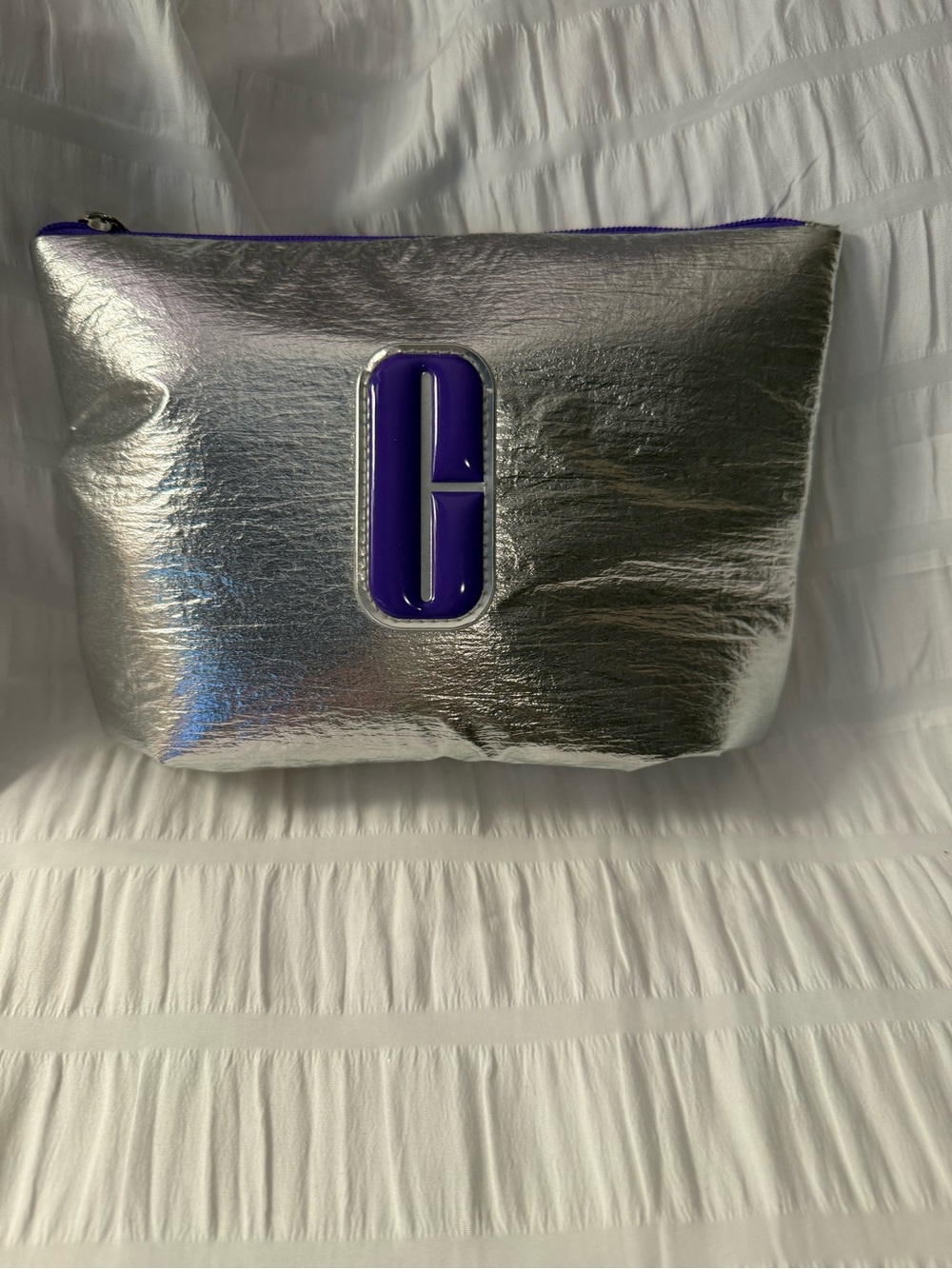 Clinique Metallic Silver Cosmetic Pouch with sought after Purple Logo NWOT